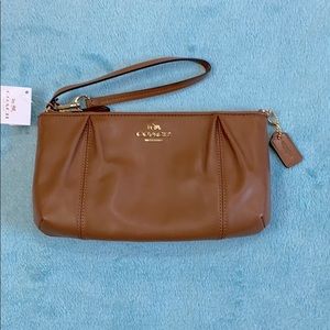NWT Coach wristlet bag Colette Saddle color